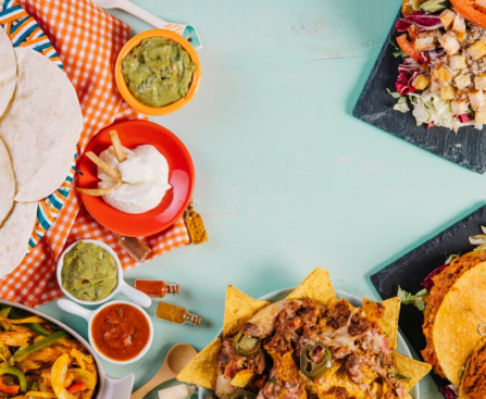 Various Mexican dishes on a table