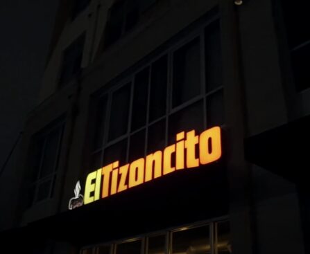 signange of El Tizoncito restaurant at night