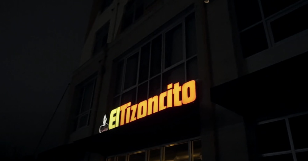 signange of El Tizoncito restaurant at night